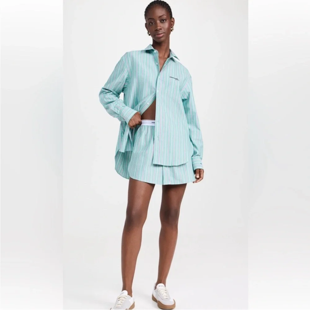 HOMMEGIRLS Shirttail Mini Skirt. Size M.BNWT. MSRP $195.